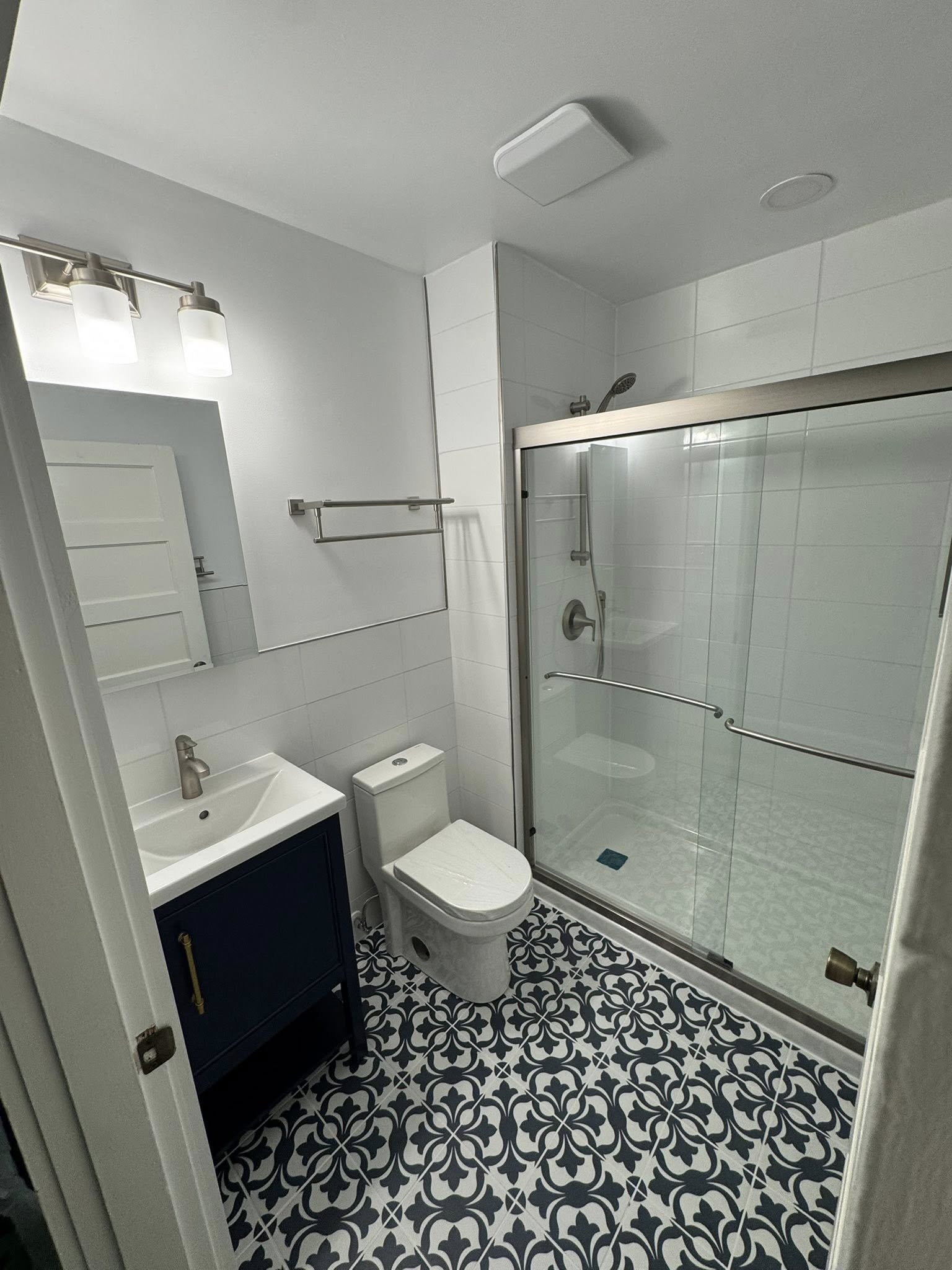 Bathroom after remodeling Warrenton VA navy vanity
